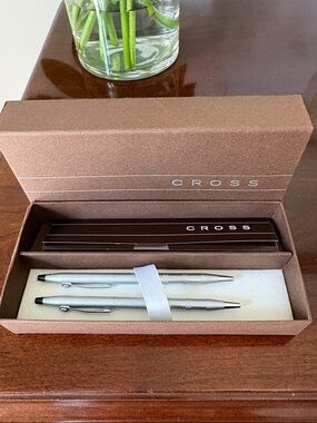 Cross Apogee “Frosty Steel” pen and pencil set with Mercedes logo clips.